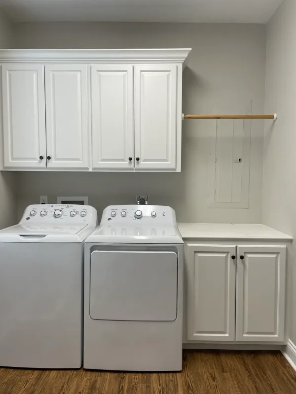 Cypress Construction Custom Utility Room Cabinetry